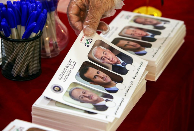 A ballot bearing the images of presidential candidates Mahmoud Merhi (L), President Bashar al-Assad (C) and Abdullah Salloum Abdullah (R), seen here in elections held at the Syrian embassy in Kuwait on May 20