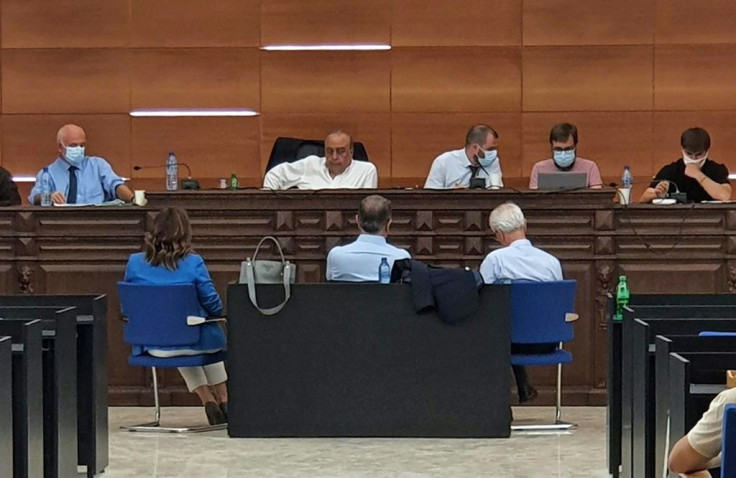 French judicial investigators hear fugitive ex-auto tycoon Carlos Ghosn (front row-C) as a witness, at a courtroom in the Lebanese capital Beirut, on May 26, 2021, ahead of further questioning