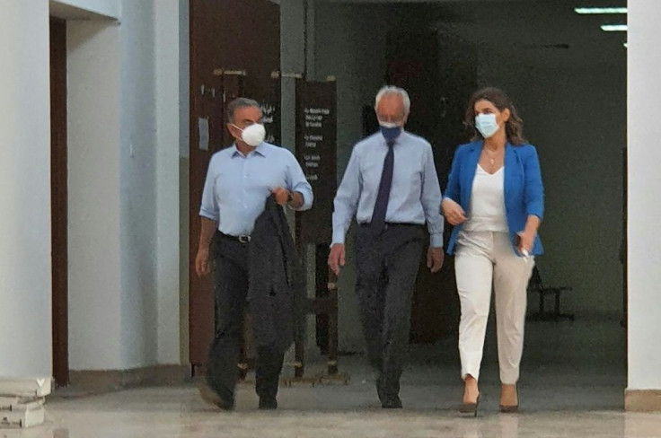 Fugitive ex-auto tycoon Carlos Ghosn (L) is pictured after being heard as a witness, at a courtroom in the Lebanese capital Beirut, on May 26, 2021