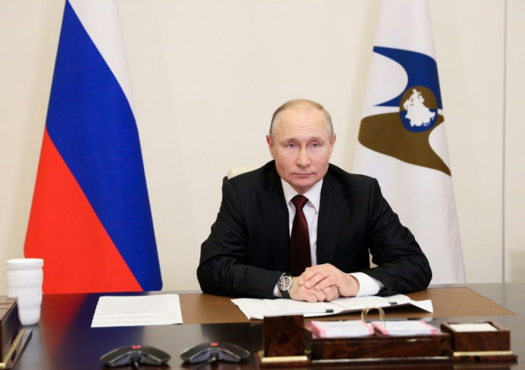 Russian President Vladimir Putin (pictured May 21, 2021) urged Russians to cast away any remaining doubts and said that the Russian vaccines were "the most reliable and safest" in the world