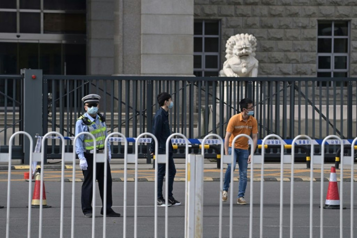 There was heavy security outside the courtroom, with the area around the entrance cordoned off with tape and large numbers of police deployed