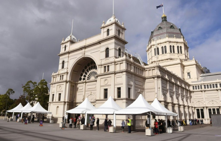 People queue at a Covid-19 vaccination centre in Melbourne. Officials said the sluggish vaccine rollout was partly to blame for the latest virus outbreak