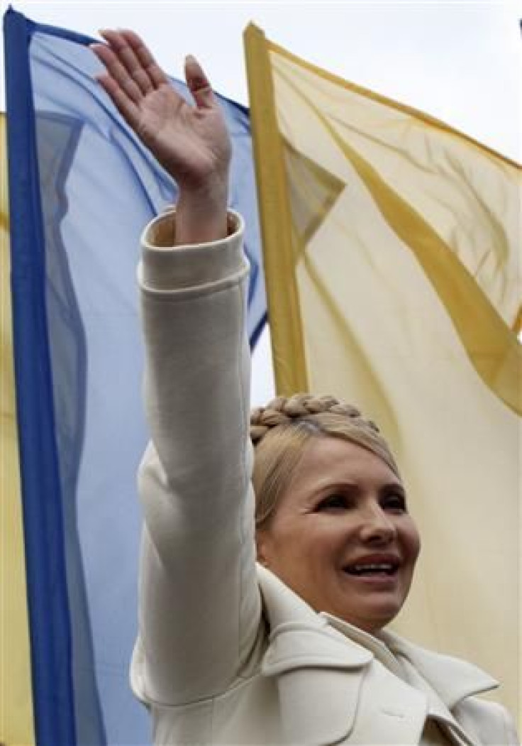 Ukraine&#039;s ex-Prime Minister and opposition leader Yulia Tymoshenko waves during a rally in front of the parliament in Kiev