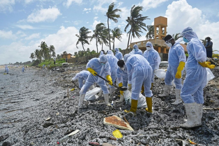 Sri Lankan Navy soldiers worked to remove debris washed ashore from the MV X-Press Pearl
