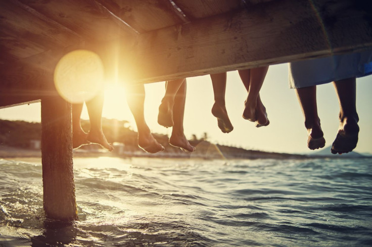 Social Capital - People sitting on pier