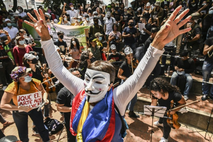 Artists perform during a protest against the government of President Ivan Duque in Medellin, Colombia, on May 26, 2021