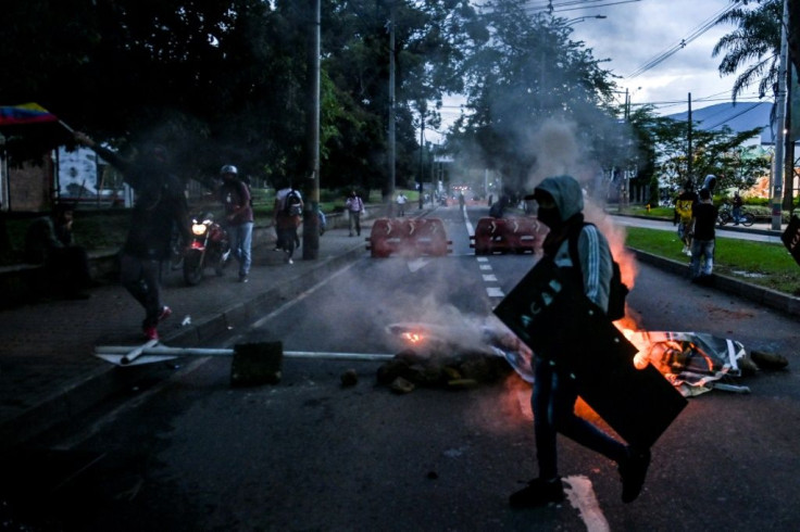 Demonstrators block a road in Medellin, Colombia on May 26, 2021