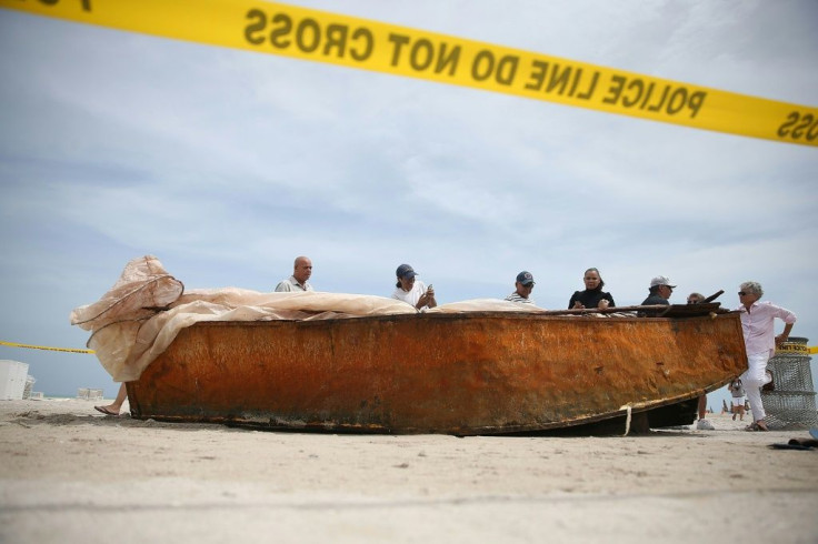 Cuban migrants often try to reach the United States on rickety boats, like this one that carried 12 people and a dog, photographed in Miami Beach, Florida on September 15, 2015