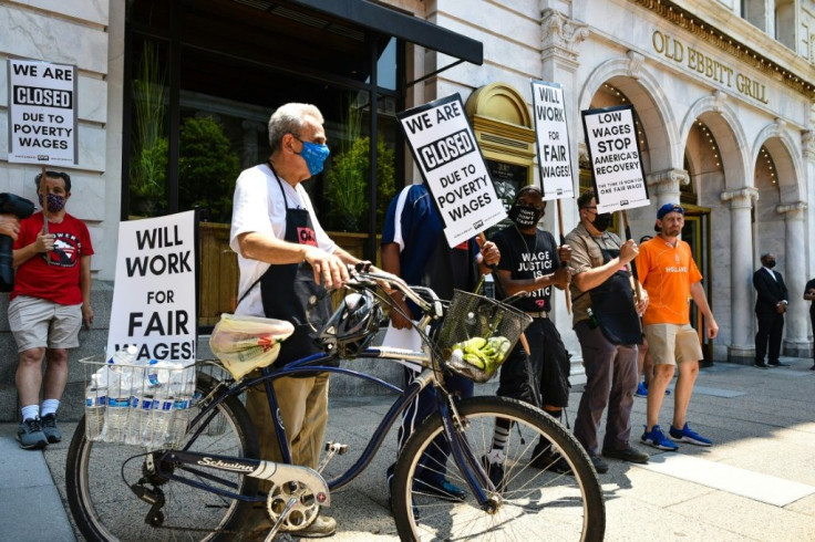 The "wage strike" outside the Old Ebbitt Grill in Washington was one of several this week aimed at drawing attention to the economic difficulties faced by restaurant workers, whose wages have dropped during the coronavirus pandemic