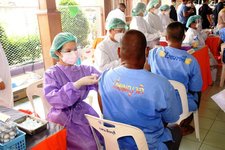 Health workers vaccinate inmates at Minburi Remand Prison in Bangkok. More than 22,000 people have tested positive for Covid-19 in overcrowded Thai jails