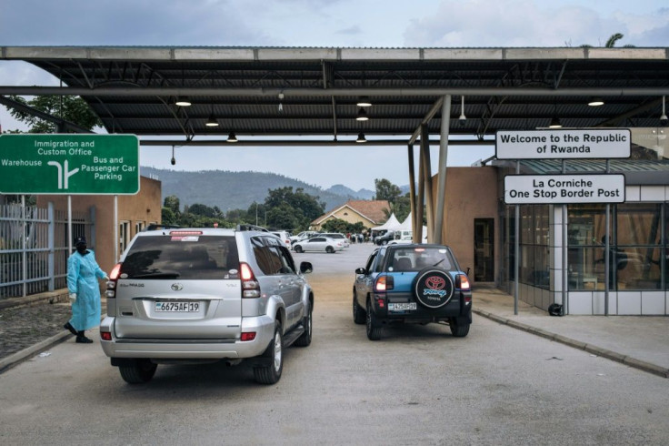 A Rwandan customs officer checks vehicles arriving from Goma