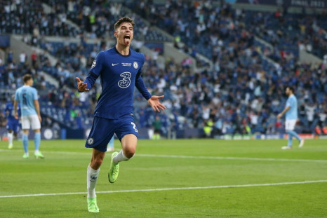 Kai Havertz runs away in celebration after scoring Chelsea's winner in the Champions League final