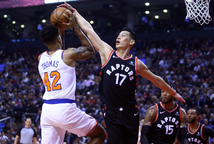 Lance Thomas #42 of the New York Knicks shoots the ball as Jeremy Lin #17 of the Toronto Raptors
