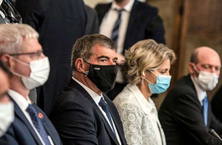 Israel's Foreign Minister Gabi Ashkenazi, wearing a black facemask, at Tahrir Palace in Egypt's capital Cairo