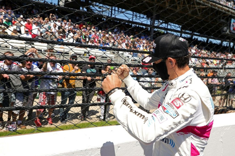 Brazil's Helio Castroneves won his fourth Indianapolis 500, tying the all-time record