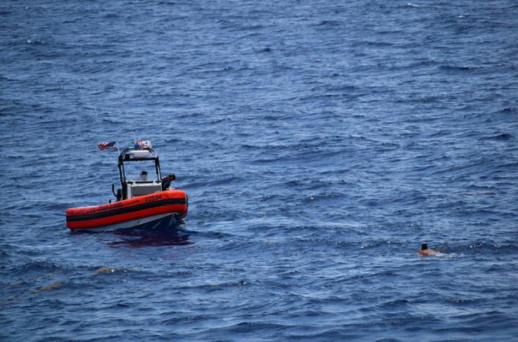 In this handout image courtesy of the US Coast Guard the Coast Guard Cutter Resolute small boat crew rescues 8 people from the water approximately 18 miles southwest of Key West, Florida, May 27,2021. The US Coast Guard said Sunday it had ended its search
