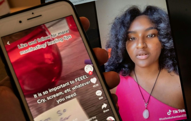 A picture of Baila Salifou, who explains the popular trend of "manifesting" on the TikTok app