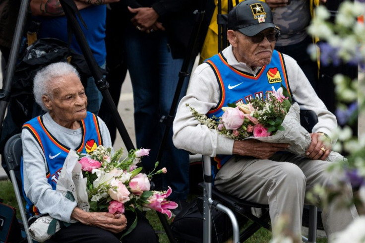 Survivors Viola Fletcher (L) and Hughes Van Ellis look on during a soil dedication ceremony for victims of the 1921 Tulsa Race Massacre, on the 100-year anniversary in Tulsa, Oklahoma