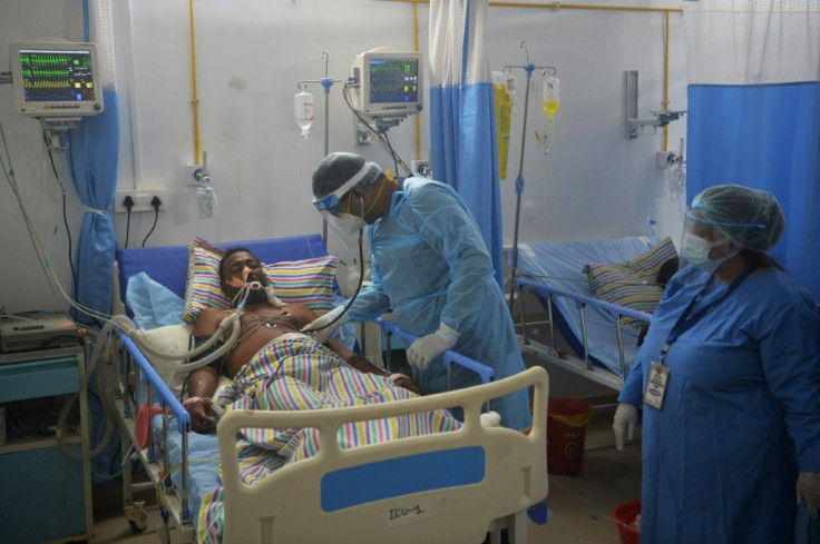 Coronavirus infections have killed at least 165,000 people in the vast South Asian nation -- home to some of the world's most densely populated cities -- since the start of April
