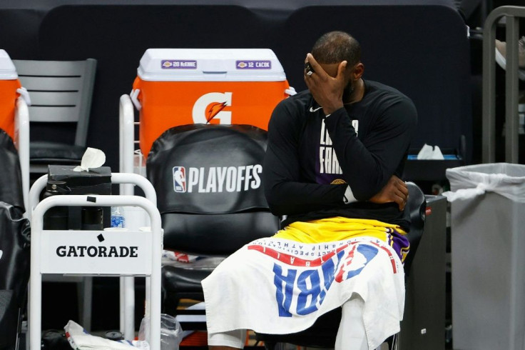 LeBron James reacts as the Los Angeles Lakers slump to a 115-85 loss to the Phoenix Suns on Tuesday
