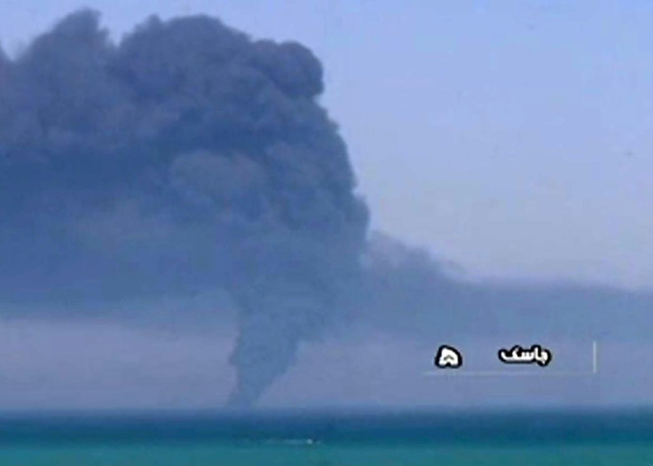 Footage aired by Iranian state television showed a massive column of smoke rising from what it said was the naval supply vessel Kharg on fire before it sank in the Gulf of Oman