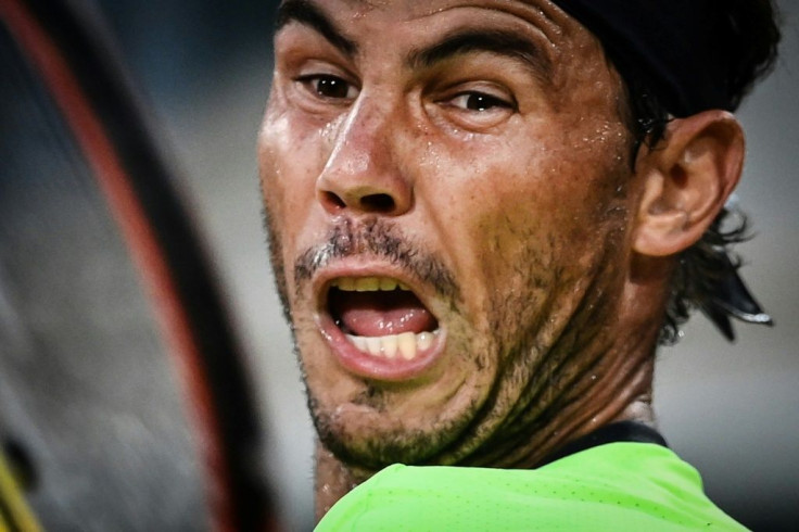 Face of a champion: Rafael Nadal reacts as he returns the ball to Richard Gasquet