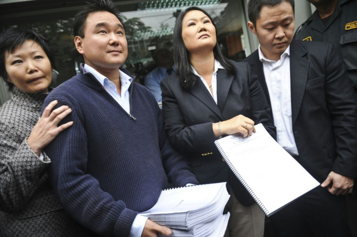 Keiko Fujimori (second from right) fell out with her politician brother Kenji (right) when battling to take over their father Alberto's political mantle