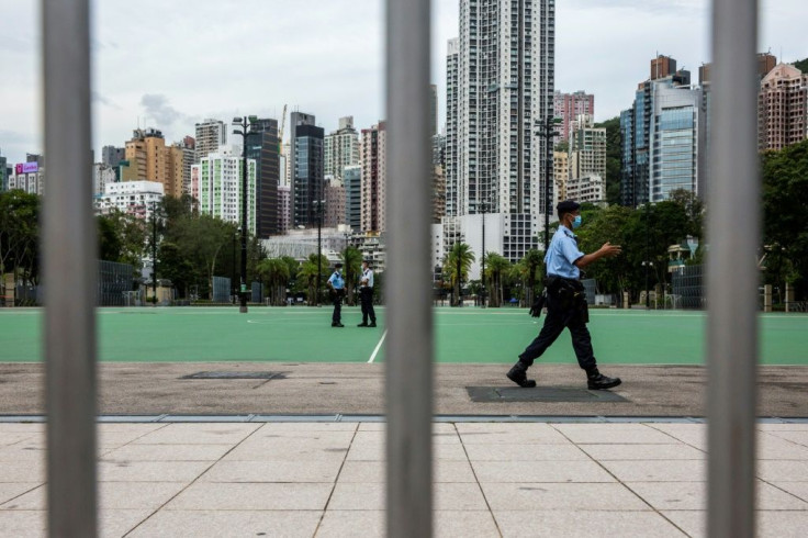 Police patrol Victoria Park in Hong Kong as authorities seek to prevent any mass remembrance of the Tiananmen crackdown