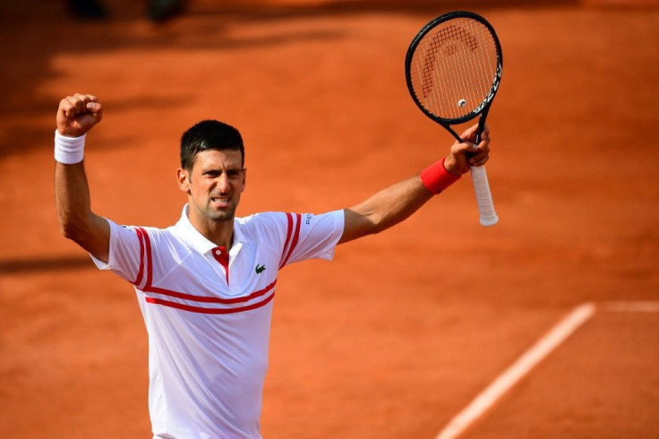 Crowd salute: Novak Djokovic celebrates after winning against Uruguay's Pablo Cuevas in the second round