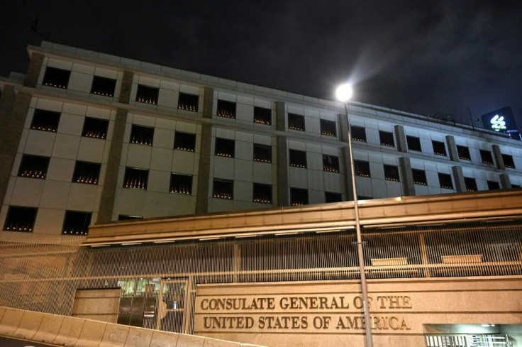 Candles are seen lit in the windows of the US consulate in Hong Kong to mark the 32nd anniversary of Beijing's deadly Tiananmen Square crackdown in 1989