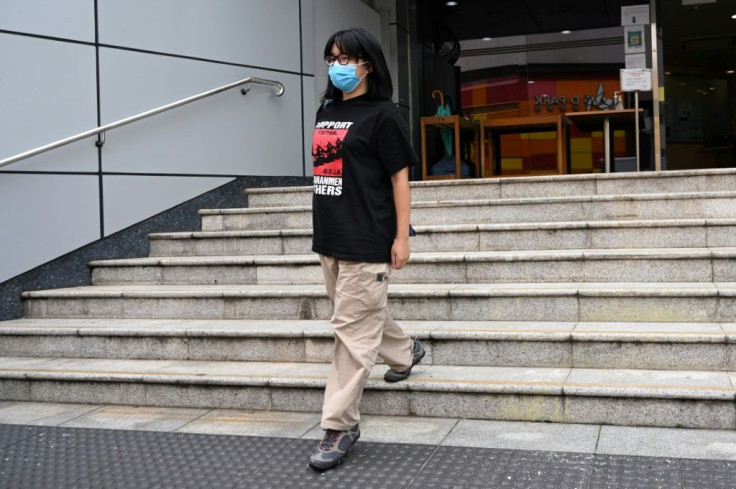 Lawyer Chow Hang-tung, one of the few remaining prominent democracy activists not already in jail or in exile, was detained by four police officers outside her work for publicising an unlawful assembly