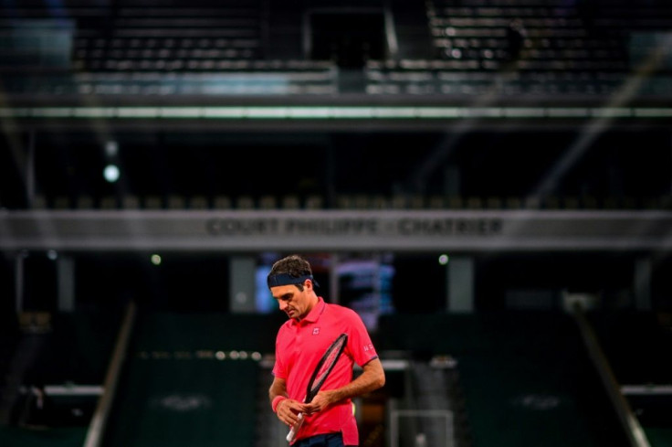 Running on empty: Roger Federer playing against Germany's Dominik Koepfer in an empty Court Philippe Chatrier