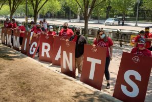 Immigration rights activists take part in a rally to demand action on citizenship at Lafayette Square, across from the White House in Washington, DC on May 26, 2021