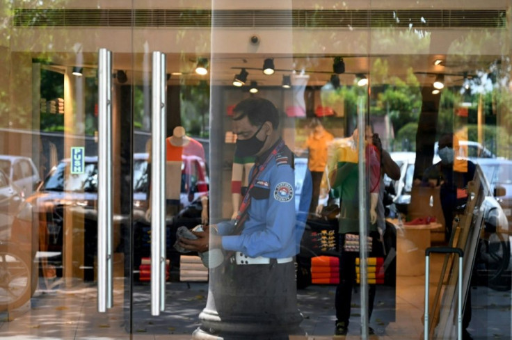 Some shops and businesses have also been allowed to reopen in India, which was battling one of the worst coronavirus waves in the world