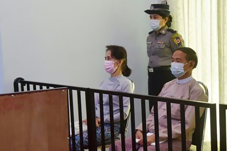 Aung San Suu Kyi (left) and detained president Win Myint (right) during their first court appearance in Naypyidaw