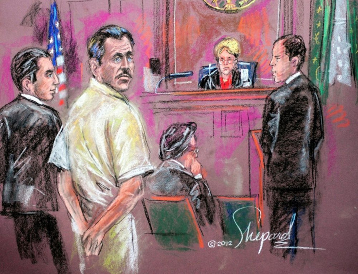 Viktor Bout (in white) was arrested in Thailand in a sting operation