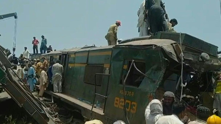At least 40 people were killed and dozens injured when a packed Pakistani inter-city train ploughed into another express that had derailed just minutes earlier, officials said.