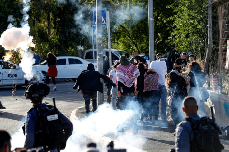 Israeli police fire tear gas at a protest against the threatened eviction of Palestinian families from their homes in Israeli-annexed east Jerusalem