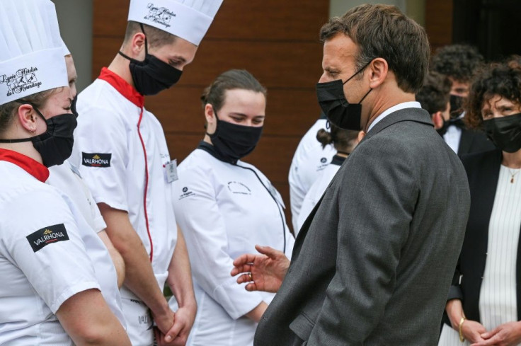 Macron talks with students at the Hospitality school in Tain l'Hermitage during the second stop of his nationwide tour