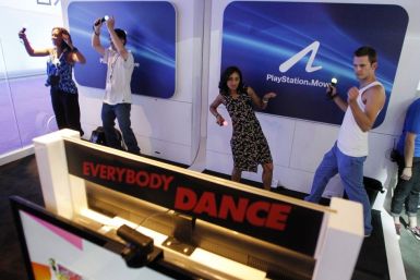 People dance as they play the Sony PlayStation Move video game &quot;Everybody Dance&quot; during the Electronic Entertainment Expo or E3 in Los Angeles