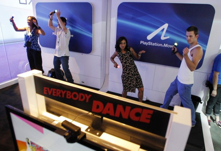 People dance as they play the Sony PlayStation Move video game &quot;Everybody Dance&quot; during the Electronic Entertainment Expo or E3 in Los Angeles