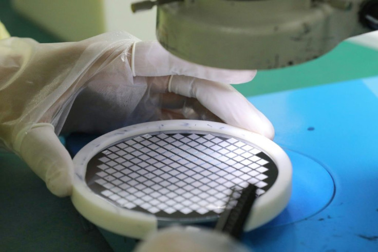 High-tech chips like this one being produced at a semiconductor factory in eastern China's Jiangsu province are a focus of massive US legislation aimed at countering a surging economic threat from rival China