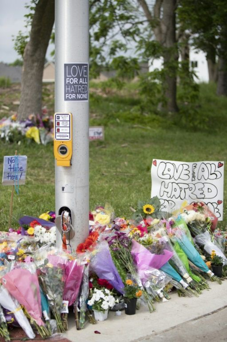 Flower bouquets and toys have been placed at the scene of the attack that killed four memebers of a Muslim family in London, Ontario