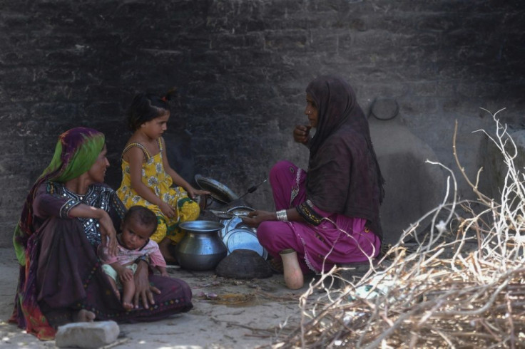 Habiba Mai (R) cooked meals and prepared tea for the injured and the rescue teams