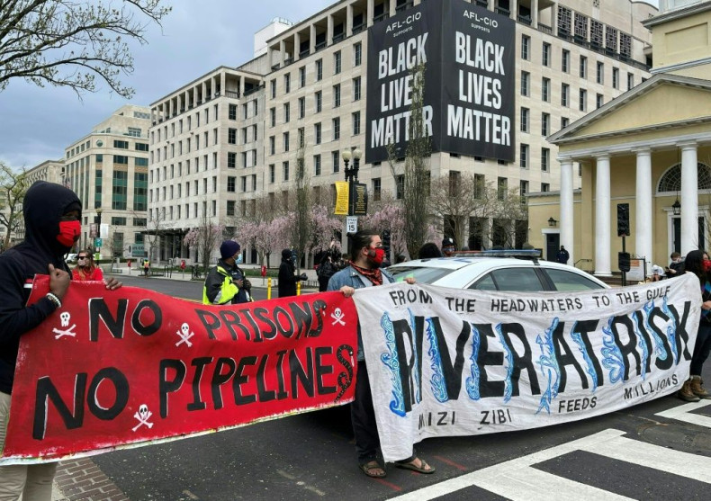 Activists in April displayed banners referring to the shutting down of existing oil pipelines in the northern United States at Black Lives Matter Plaza in Washington