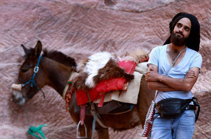 A Jordanian donkey owner waits for customers at Petra, where many workers have struggled to earn an income after tourist numbers dried up amid the coronavirus pandemic