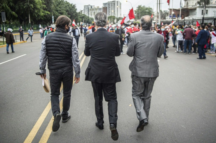 Demonstrators in Lima -- a Fujimori stronghold where she has strong support among the business elite -- join a rally supporting the right-wing candidate