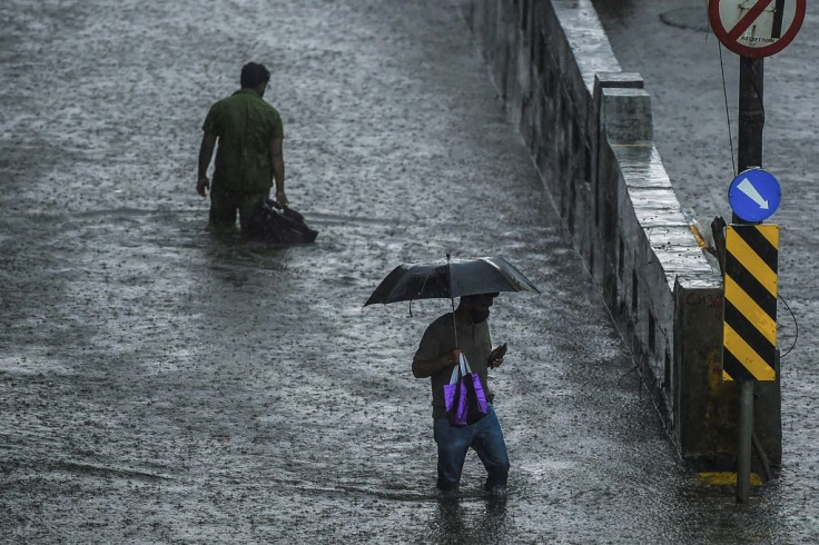 Seasonal monsoon rains hit Mumbai on Wednesday, bringing widespread flooding and traffic chaos