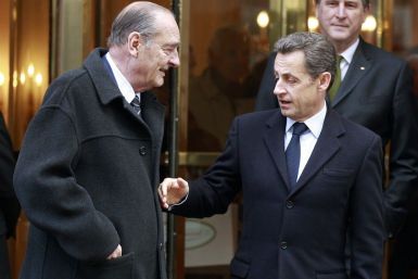 France&#039;s President Nicolas Sarkozy shakes hands with former president Jacques Chirac after lunch at Hotel in Paris