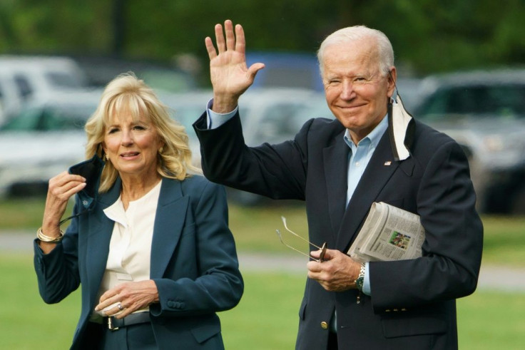 US President Joe Biden (right) campaigned on increasing taxes on the rich